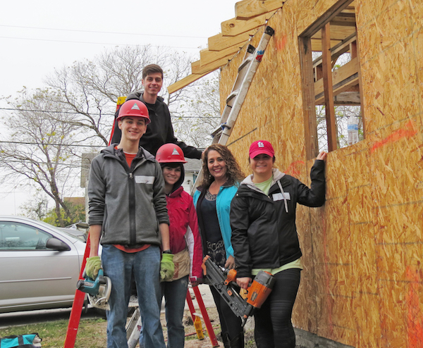 A group of students from the University of Missouri spent the winter break in Corpus Christi building homes for the local Habitat for Humanity chapter. Volunteer coordinator Priscilla Hinojosa said more homes can be built if more volunteers can be found. Photo by Nickie Snow Stillman