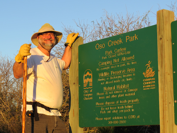 Oso Creek Park Adopt-A-Park volunteer Art Norman proudly shows off the work completed by volunteers that has made the park a vibrant addition to the community. Photo by Nickie Snow Stillman