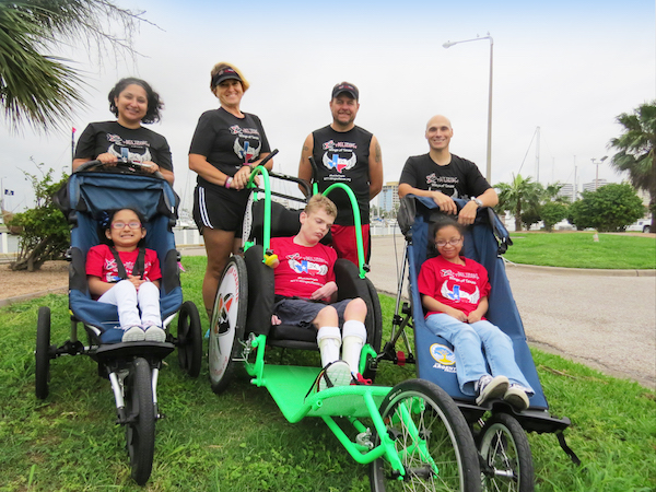 Captains on MyTeam Triumph: Wings of Texas in Corpus Christi with angels (from left) Laura Flores and daughter, Sara, 5; Michelle and Rusty Jones and son, Charlie, 16; and Maj. Anthony Navarrette and Lori Longoria, 18. Photo by Nickie Snow Stillman