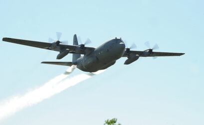 A C-130H cargo plane from the U.S. Air Force Reserves 910th Airlift Wing which is now spraying for mosquitos along the Texas Gulf Coast. The aircraft can dispense approximately 300 gallons a minute through its 12-nozzle system. (U.S. Air Force file photo/Airman 1st Class Zachiah Roberson)