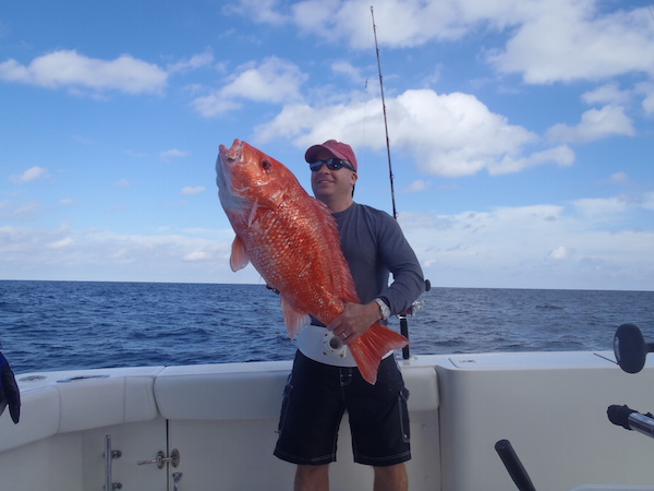 Jamison Wyatt of New Braunfels proudly holds up a 33-pound red snapper he caught in federal waters off the Gulf Coast. Snapper were not in season when this one took the bait in January 2014, so once he captured his digital trophy, he returned it to the sea. Courtesy photo