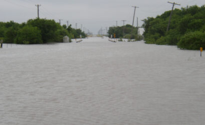 Oso Creek in Corpus Christi overflows its banks on Thursday, July 8. The Coastal Bend remains under a flash flood warning until 7 p.m. Friday, July 9, according to the National Weather Service.