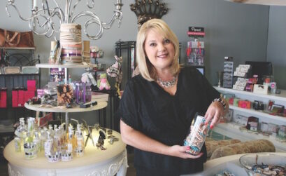 Deana Martini, owner of Deana Merrill’s Salon and Royalty Gifts, in her unique boutique in King’s Crossing Shopping Center at the corner of S. Staples and Yorktown. Photo by Carrie Robertson Meyer/Third Coast Photo