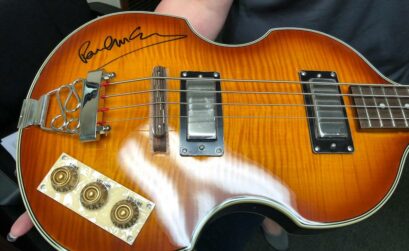 This bass guitar signed by Paul McCartney is just one of the many celebrity signatures (Willie Nelson, Michael Jordan, Muhammad Ali, Aretha Franklin, and more) available on instruments, albums, album covers, pictures, and posters at HELP Hits the High Notes fundraiser and silent auction Oct. 24 at Brewster Street Ice House. Courtesy Photo Hammons Education Leadership Program