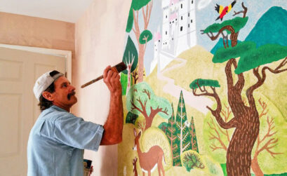 Walter Lee, owner of Affordable Walt’s, adds a mural of a child’s favorite coloring book page to a bedroom wall. The page is a favorite of one of Lee’s long-time customer’s children. Photo by Jane Kathleen Gregorio