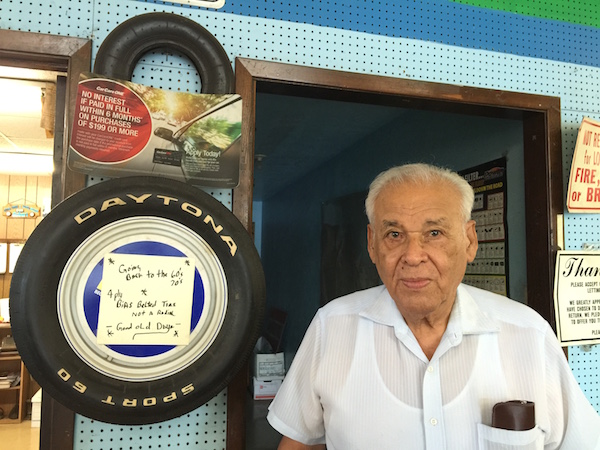 Willie Loa, 89, wants to open Loa's Auto Service seven days a week. Martha Gomez, his daughter and shop manager, insists on a work-life balance. Photo by Adam Barrera