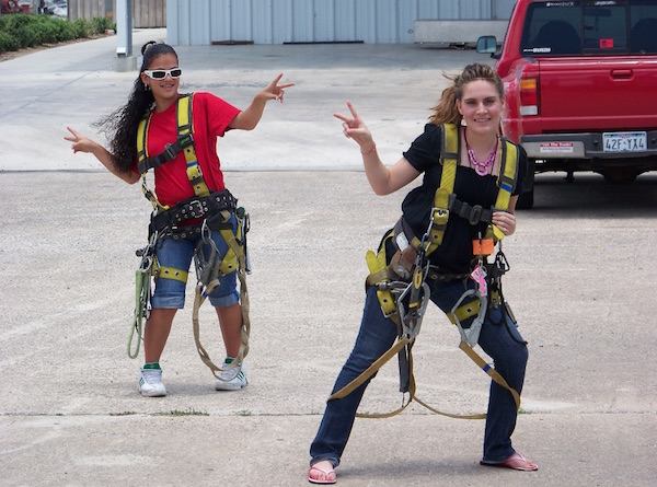 Sometime last year, student HELP participants Kelsey Polk and Nicki Villarreal celebrate after a welding and scaffolding class at Craft Training Center of the Coastal Bend, one of HELP’s biggest partners for on-site career experience. HELP also brings in students from the Nueces County Juvenile Justice Center, as it did in March 2018. Courtesy photo