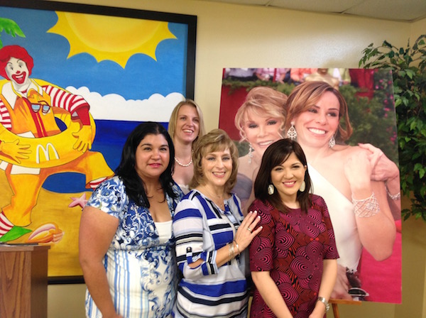 Members of the board of directors of the Corpus Christi Ronald McDonald House attending a press conference and phone interview with keynote speaker Melissa Rivers were (from left) Priscilla Olivarez, Kimberly Wilmoth, Amy Griffin and Anabella Garza. The group posed with a picture of Rivers and her late mother Joan Rivers. Photo by Suzanne Freeman