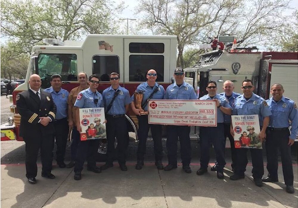 Members of the Corpus Christi Professional Firefighters Association present a giant check for $105,000 to the Muscular Dystrophy Association after the 2018 Fill the Boot fundraising efforts. Courtesy photo