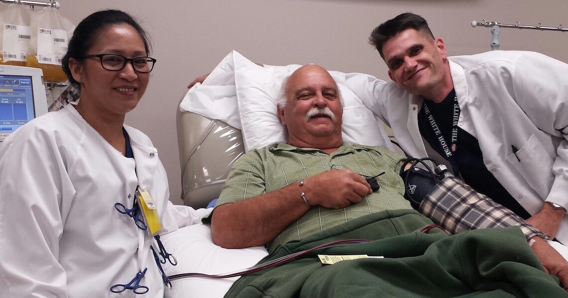 Frequent blood donor Ralph Balko (center) with apheresis technician Danny White and Charmy Advencula of the Coastal Bend Blood Center. The nonprofit conducts blood drives to meet the constant need for blood and platelets in 10 Coastal Bend counties. Photo by Anne M. Garcia