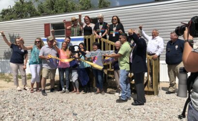Jannet Bardwell and her two grandchildren receive the keys to their new manufactured home in Fulton from the Coastal Bend Disaster Recovery Group. The Coastal Bend Food Bank and other organizations that helped in putting this family back in a home were also on hand to celebrate. Courtesy photo