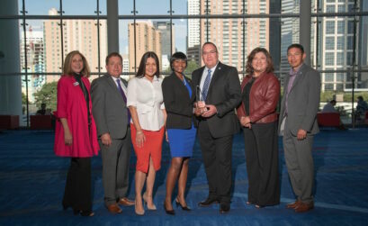Showing off the Texas Municipal League for Excellence award recently won by the city of Corpus Christi are council members Debbie Lindsay-Opel (left) and Rudy Garza, Learning and Organizational Development analyst Megan Ysassi, Learning and Organizational Development Manager Liza Wisner, Director of Human Resources Steven Viera, Assistant City Manager Sylvia Carrillo-Trevino, and council member Ben Molina. Photo courtesy of city of Corpus Christi