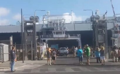 An inbound LNG tanker had a close call with the Texas 361 ferry, which evacuated as tugboats managed to steer the giant vessel clear just in time. The incident occurred August 12, just hours before a public meeting with the Port of Corpus Christi to discuss building an oil and gas terminal with two ship docks on Harbor Island. Two days later, another company, Axis Midstream, announced it also plans to build a similar terminal, also with two docks. Courtesy photo from video footage
