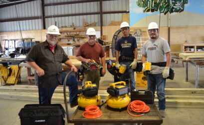 The first class of the Rebuild Texas Carpentry Skills Training program at Rockport-Fulton High School includes (from left) instructor Alex Bayarena and students Terry Roller, Aaron Rodriguez, and Fernando Reyes. Courtesy photo
