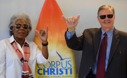 City Manager Margie Rose and Mayor Joe McComb demonstrate the art of the selfie during the unveiling of the ‘See Corpus Christi Welcome Experience’ at Corpus Christi International Airport on June 3. Courtesy photo