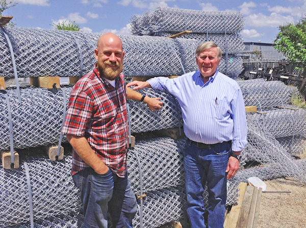 Joe Keane Hilliard (left) and father Joe Mack Hilliard make a living building fences that stand the test of time and a coastal clime. Owner of Fencing Inc. of Texas, Joe Mack Hilliard has been building fences in Corpus Christi since 1976. Photo by Suzanne Freeman