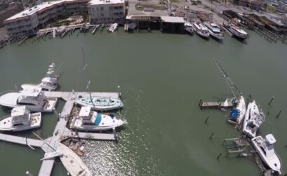 A drone flying over the Port Aransas City Marina just after Hurricane Harvey struck in August 2017. The city will use part of a $5 million grant from the U.S. Department of Commerce to rebuild the harbor master’s office, docks, and other amenities at the marina. Courtesy photo