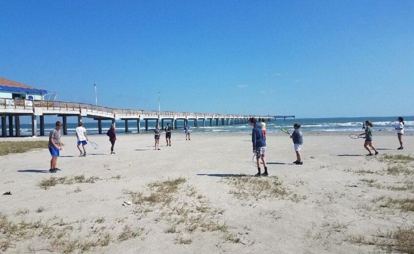 The Port Aransas High School tennis team takes practice to the beach after returning to school October 16. Classes are being conducted in portable buildings while the school district rebuilds after Hurricane Harvey destroyed the campus. As of the middle of the first week of back to school, enrollment was just over 80 percent of what it was when the school evacuated August 25. Photo courtesy Port Aransas ISD