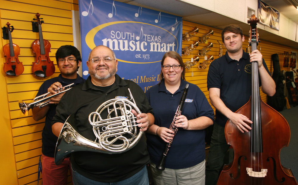 South Texas Music Mart General Manager Larry Germain on the showroom floor at 5253 S. Staples St. in Corpus Christi. Germain began working in the store two weeks after he and his wife, Cesarea, were married. That was 37 years ago. Photo by Carrie Robertson Meyer/Third Coast Photo