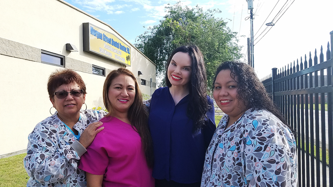 The staff at Morgan Street Dental Center take pride in providing quality work and friendly service. From left are Elvie Landa, Elizabeth Roberts, Erin Boswell and Jeanette Garcia. Photo by Jane Kathleen Gregorio