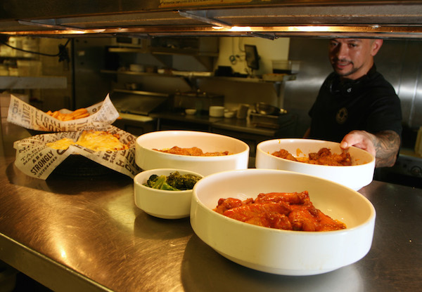 The food at Buffalo Wings & Rings, 5638 Saratoga Blvd. in Corpus Christi, starts fresh. Wings are big and saucy and come in a variety of flavors and levels of spicy, hot goodness. Photo by Carrie Robertson Meyer/Third Coast Photo