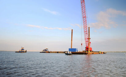 Over a period of several weeks, workers loaded 14,000-pound concrete barriers onto barges by crane to rebuild oyster reefs in Aransas Bay in a project initiated by the Harte Research Institute at Texas A&M University-Corpus Christi. Courtesy photo
