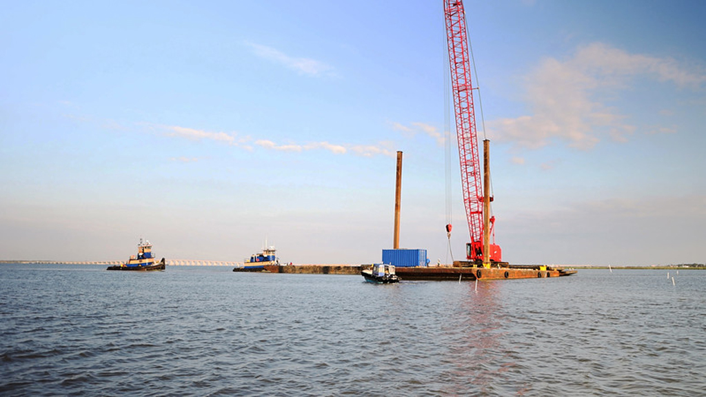 Over a period of several weeks, workers loaded 14,000-pound concrete barriers onto barges by crane to rebuild oyster reefs in Aransas Bay in a project initiated by the Harte Research Institute at Texas A&M University-Corpus Christi. Courtesy photo