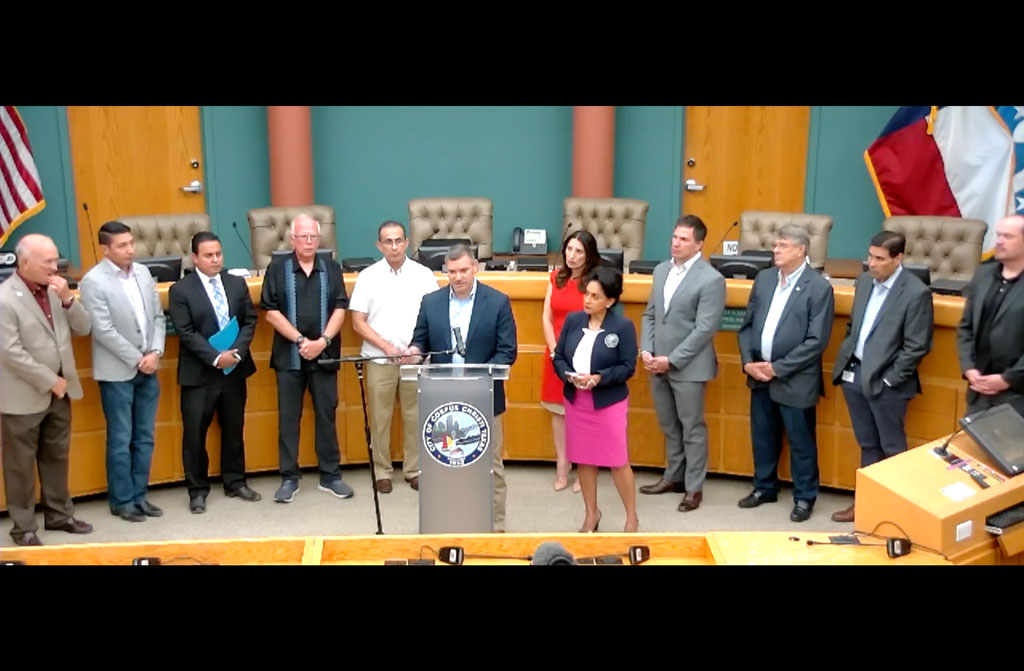 Texas Department of Transportation engineer Valente Olivarez Jr. takes questions during a media conference with Nueces County officials, who demanded the state agency be more transparent on the reasons it halted construction of the new Harbor Bridge. Attending were City Council members Mike Pusley (left) and Ben Molina, a representative from state Sen. Chuy Hinojosa’s office, state Reps. Todd Hunter and Abel Herrero, Nueces County Judge Barbara Canales, Corpus Christi City Manager Peter Zanoni, Port of Corpus Christi Board Chair Charles Zahn, and City Council members Gil Hernandez and John Martinez. Screen capture