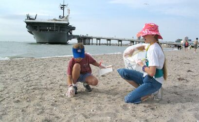 Volunteers clean up along North Beach in Corps Christi alongside the USS Lexington Museum on the Bay at a 2013 event. A regional cleanup is set for Feb. 7 at six different locations in the Coastal Bend, including North Beach. Check-in for North Beach is 8: