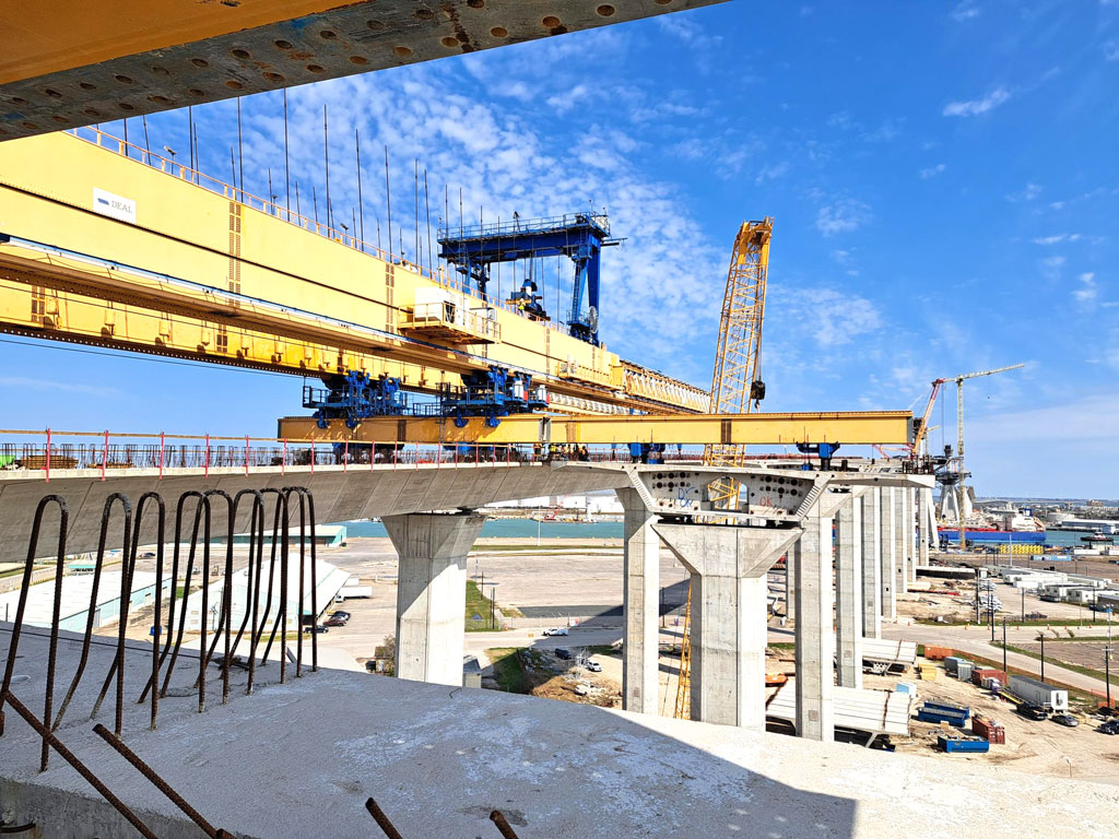 The south approach gantry crew completed installing southbound main lane spans on the new Harbor Bridge in February. The precast yard is casting about seven main span/delta frame segments per week, while work on other joint pier segments has been delayed because of safety concerns. Courtesy photo