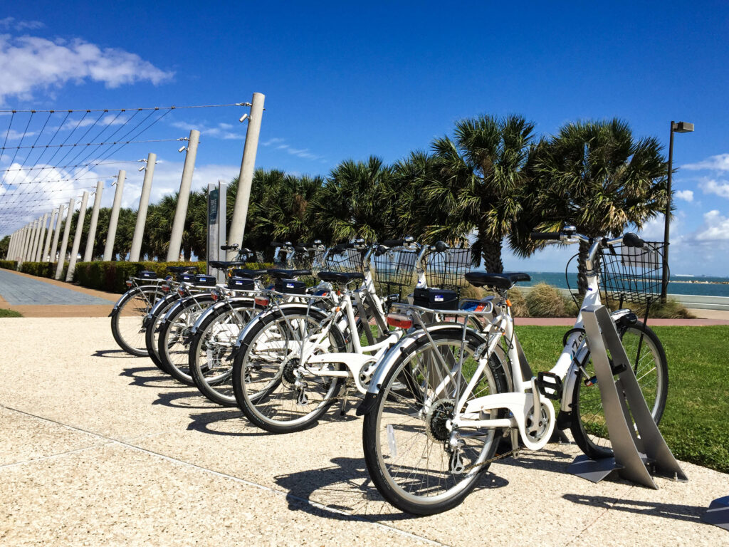 Tourists and locals alike enjoy the new bike share program along the seawall in downtown Corpus Christi. Photo by JoAnna Kopp