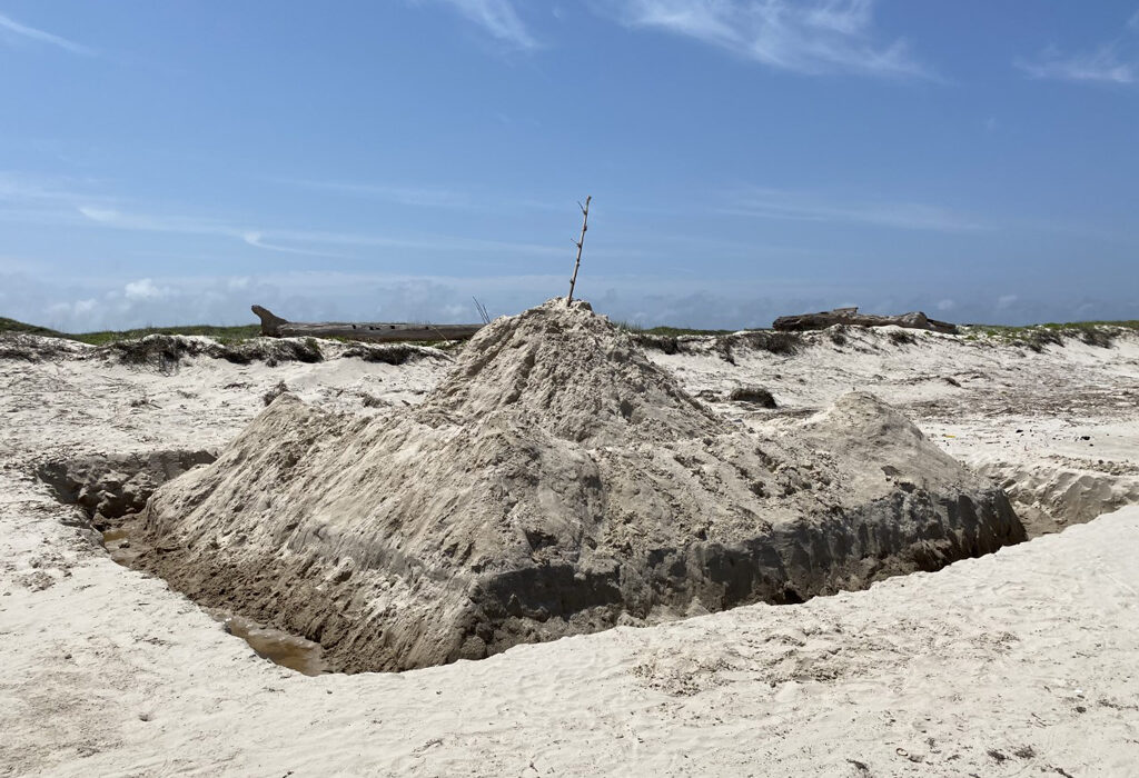 Large sandcastles that are not flattened at the end of the day present a hazard to beach walkers, patrol vehicles, and endangered sea turtles at Padre Island National Seashore in Corpus Christi. Courtesy photo
