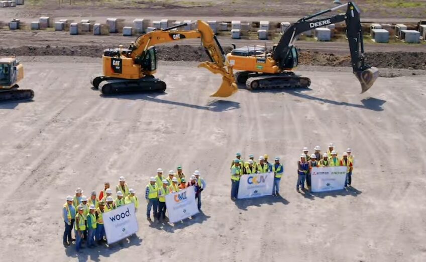 Backhoes stand ready to dig into the earth during groundbreaking ceremonies September 12 at the ExxonMobil-SABIC plastics plant being built in Gregory near Corpus Christi. About 200 local officials watched on screen from inside the Orientation and Training Center on site. Courtesy photo