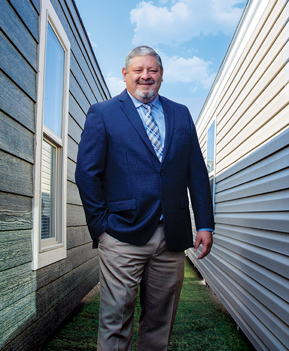 Gilbert Escobar, general manager of Manufactured Housing Consultants in Corpus Christi, says customers are attracted to the high quality of today’s manufactured homes. Photo by Jane Kathleen Gregorio