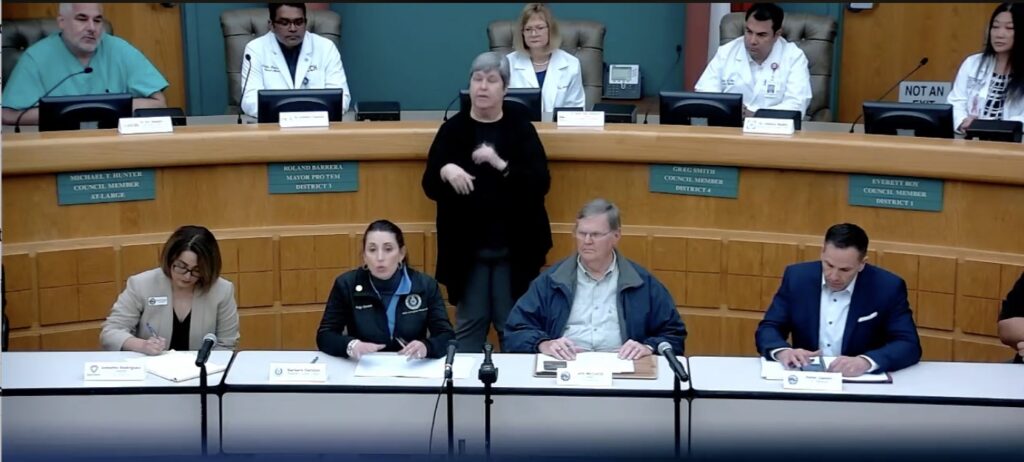 Officials announcing the first Nueces County case of COVID-19 include Director of City/County Public Health Annette Rodriguez (left), County Judge Barbara Canales, Corpus Christi Mayor Joe McComb, and City Manager Peter Zanoni. Screen capture taken from Facebook live