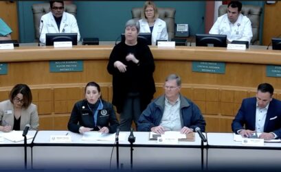 Officials announcing the first Nueces County case of COVID-19 include Director of City/County Public Health Annette Rodriguez (left), County Judge Barbara Canales, Corpus Christi Mayor Joe McComb, and City Manager Peter Zanoni. Screen capture taken from Facebook live