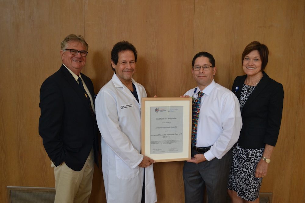 Proudly displaying the level IV Certificate of Designation recently awarded to Discoll Children’s Hospital’s neonatal intensive care unit are: (from left) Steve Woerner, President and CEO of Driscoll Health System; Miguel DeLeon, MD, Medical Director of the NICU at Driscoll Children’s Hospital; Chris Joyal, RN, BSN, CPN, NICU Director/Neonatal Program Manager for Driscoll Children’s Hospital; and Trish Carr, PhD, RNC-NIC, Associate Chief Nursing Officer, Driscoll Children’s Hospital.