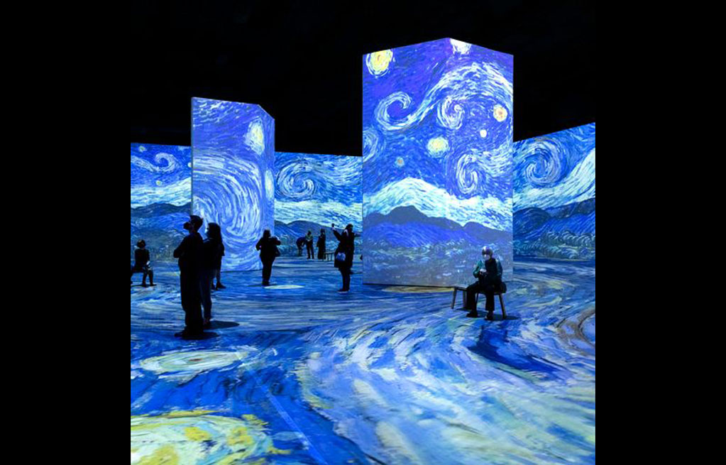 The Starry Night' surrounds visitors at 'Beyond Van Gogh: The Immersive Experience.' Photo by Timothy Norris/Beyond Van Gogh