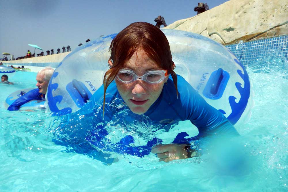 Kai Meyer tests out the five different areas of the lazy river system at Schlitterbahn Riverpark and Resort in Corpus Christi. Photo by Carrie Robertson Meyer/Third Coast Photo