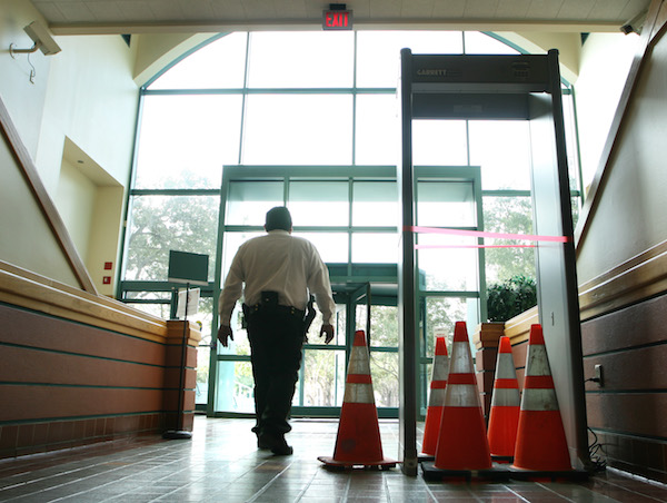 Coming into city hall now means going through a metal detector, which was recently installed on the Lipan Street side of the building, the only public entrance as of Dec. 21. Photo by Carrie Robertson Meyer/Third Coast Photo