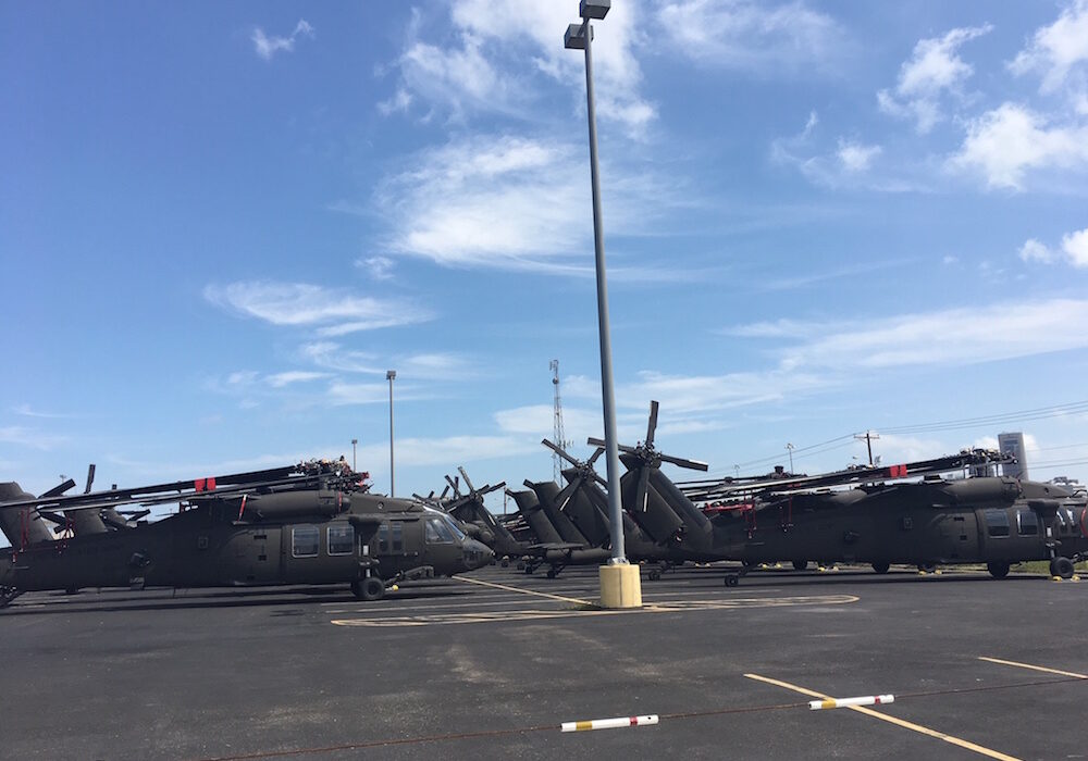 Around 80 helicopters landed in the parking lot at Whataburger Field Sept. 19, awaiting shipment to Europe out of Port Corpus Christi. Photos by Angela Sciantarelli