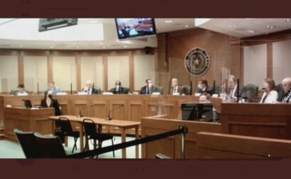 The Texas Senate Committee on Education met in person Nov. 14 behind plexiglass shields. Testimony was heard virtually on TV screens. Courtesy photo