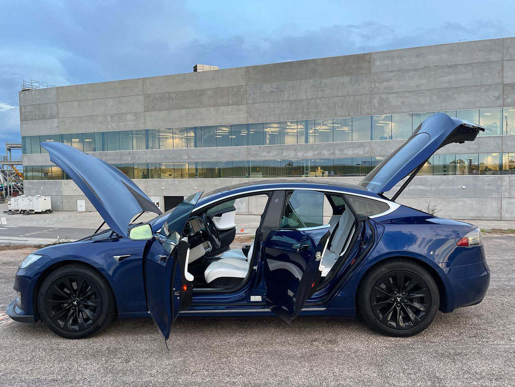 A Tesla Model S parked in front of the Gigafactory in Austin. The electric automaker is considering locating a refining plant near Robstown. Courtesy photo