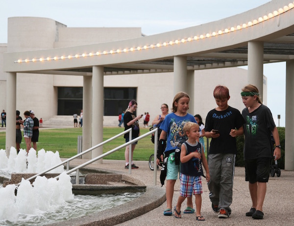 One of the most popular Pokéstops in Corpus Christi, the Water Gardens in the S.E.A. District downtown draws crowds of Pokémon hunters. Photo by Carrie Robertson Meyer/Third Coast Photo