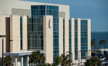 Officials cut the ribbon on the new Tidal Hall Life Science Research Building during ceremonies April 12. Students are expected to fill classrooms and labs as early as this summer. Courtesy photo
