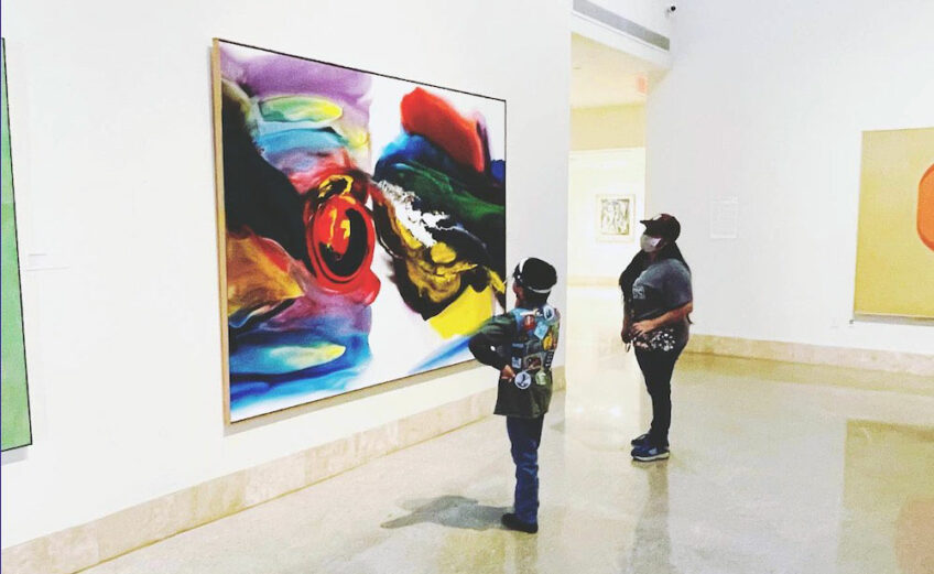 Visitors at the Art Museum of South Texas view a piece from the facility’s permanent collection, which includes more than 1,850 works of art. Courtesy photo