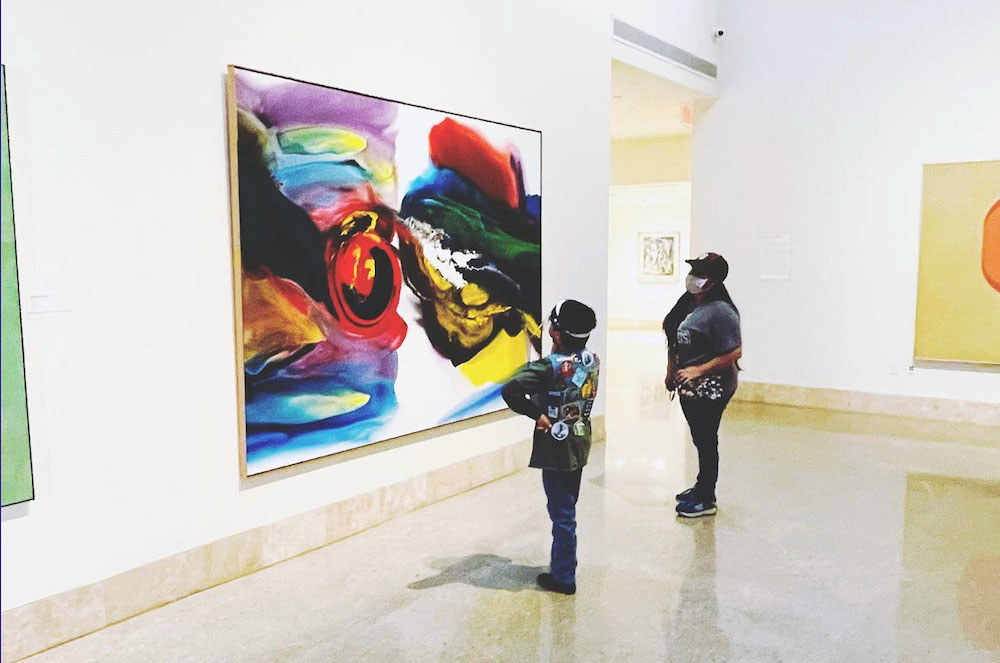 Visitors at the Art Museum of South Texas view a piece from the facility’s permanent collection, which includes more than 1,850 works of art. Courtesy photo