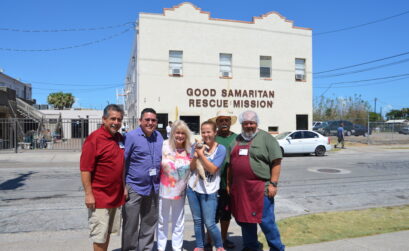 Just a few of the people who help Good Samaritan Rescue Mission run smoothly are George Quintanilla (left), laundry; Alfred Martinez, assistant to director; Carole Murphrey, executive director; Tatiana McCormick, animal care; ‘Gilbert,’ landscape services; and Ronald Plagge, food service. Front and center is Simba, a ginger tabby cat who is both a well-loved board member and a resident. Photo by Jane Kathleen Gregorio