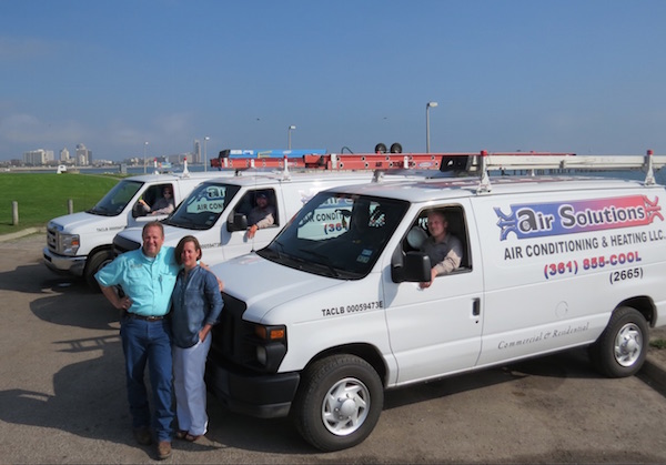 Air Solutions owners Cliff and Carrie Tonne and their team of techs (in trucks) say they are blessed to work in an industry they love. Staff Photo