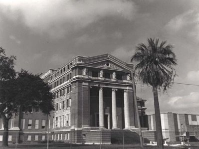 The Old Nueces County Courthouse sits behind a chain-link fence to keep out vandals and ghost hunters. The 102-year-old building is believed to be haunted. Photo courtesy TAMU-CC archives